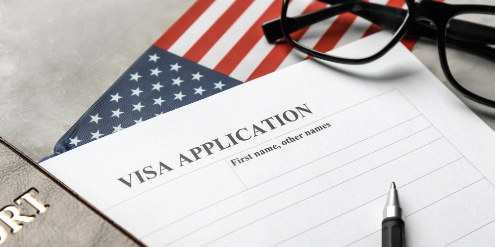 Couple reviewing K1 fiance visa documents and passport