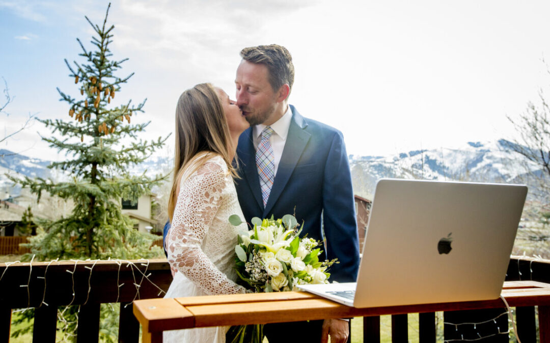 Couple checking booked summer wedding venue calendar